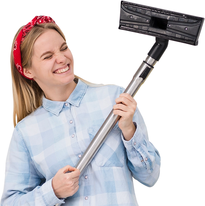 Satisfied woman using a central vacuum